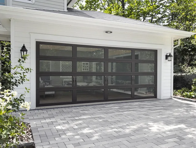 Medina Garage Door Repair design specialist presenting custom garage door options to Medina homeowner