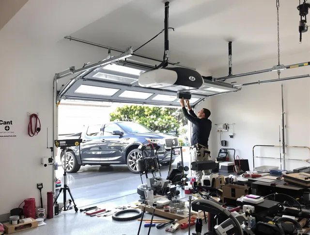 Medina Garage Door Repair specialist installing smart garage door opener system in Medina home