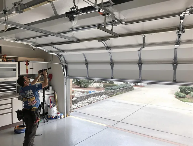 Garage door track repair service by Medina Garage Door Repair in Medina